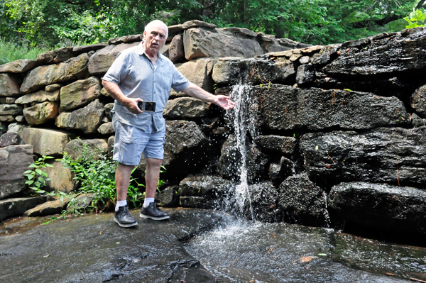 Lee Duquette checking the water temperature